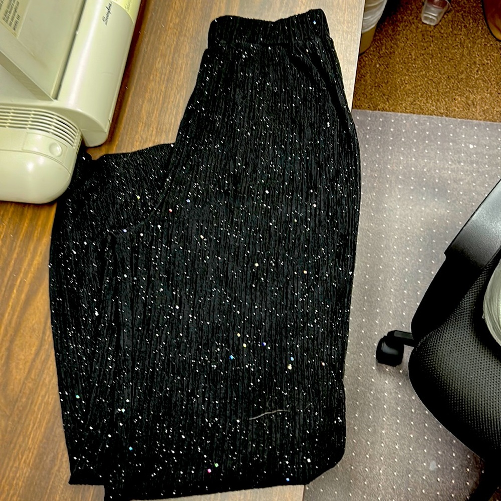 Medium, black with sliver sparkles, flowing, elastic pants